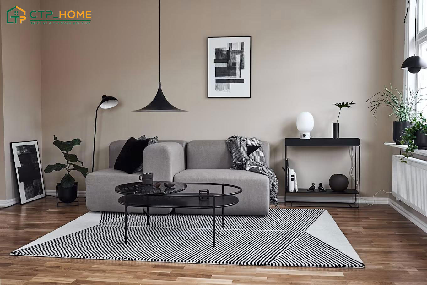 Mẫu phòng khách tối giản với tông màu xám làm chủ đạo giúp đem lại sự trẻ trung