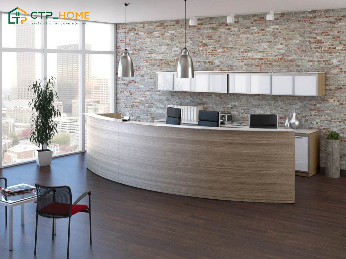 Logo công ty được đặt ngay sau bàn lễ tân kết hợp khéo léo với bàn ghế tiếp khách