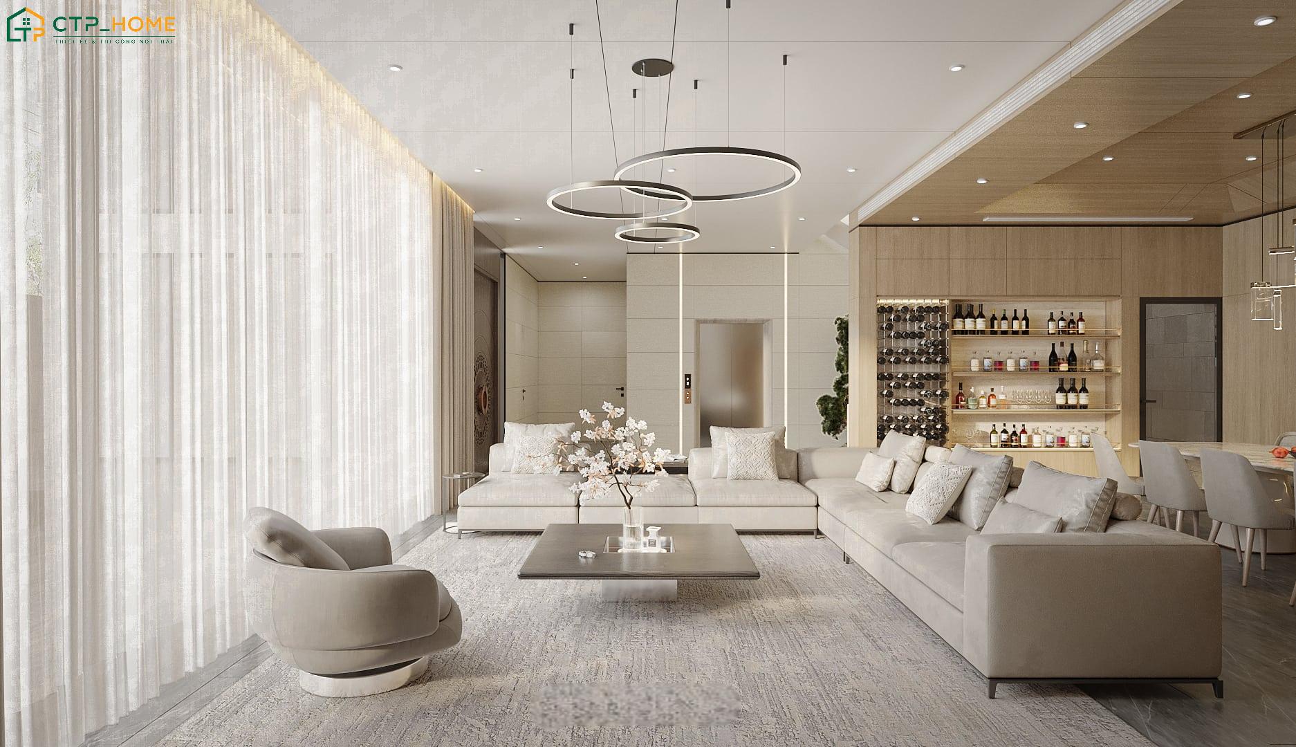 Phòng khách được bố trí khoa học, liên thông với khu vực bar, tủ rượu và cầu thang