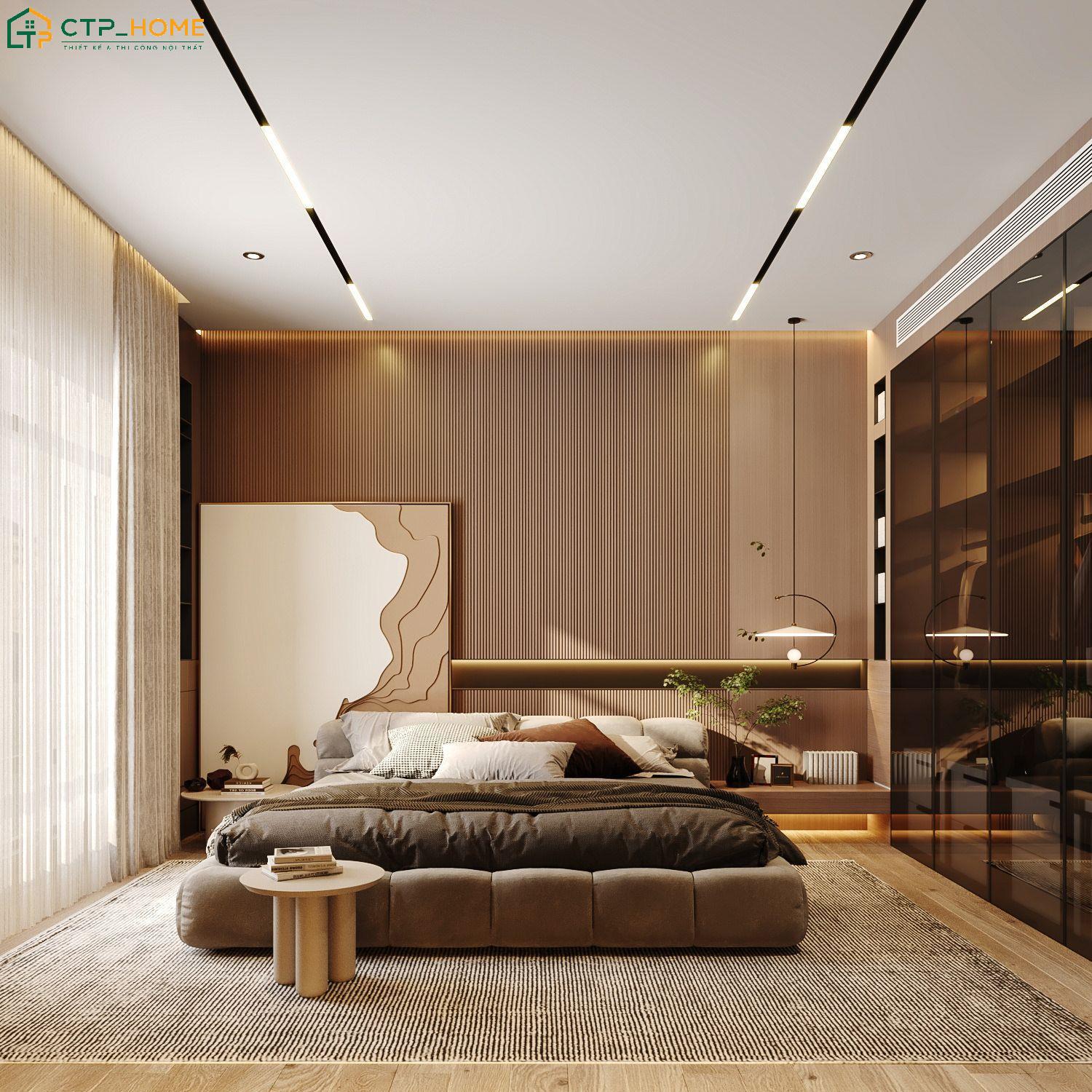 Ánh sáng vàng kết hợp tone màu trầm giúp phòng ngủ trở nên ấm áp và cuốn hút hơn