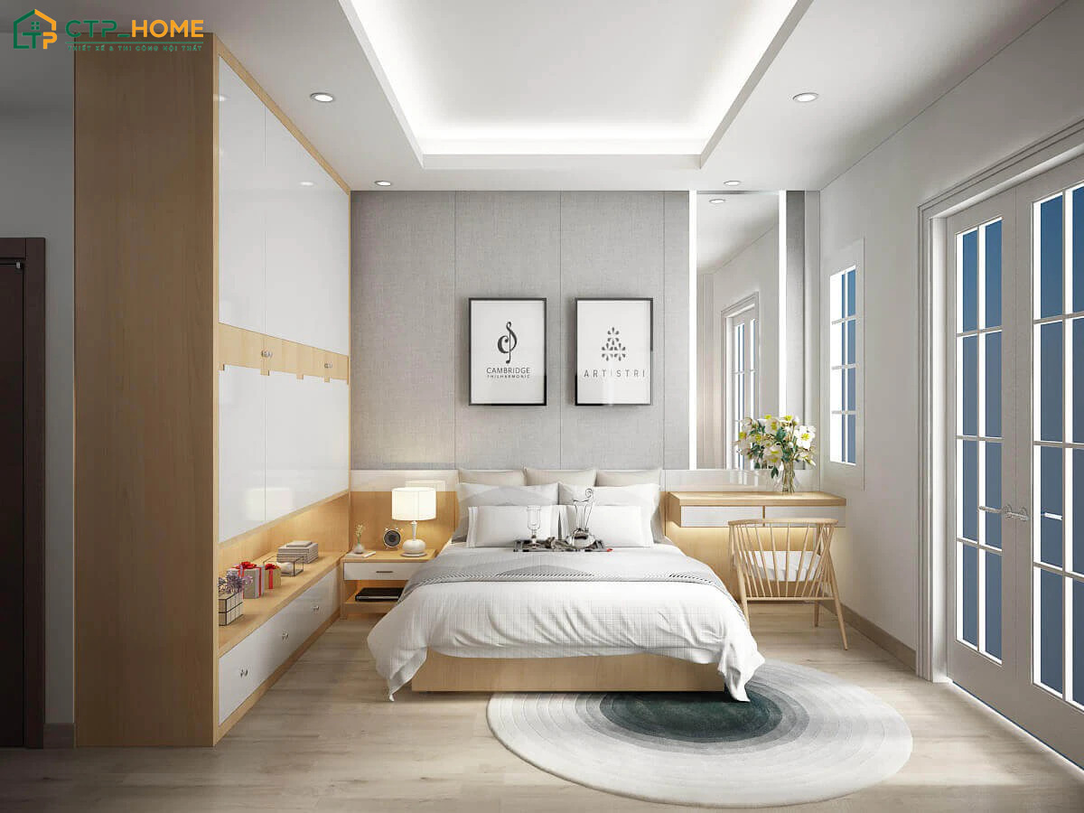 Decor phòng ngủ nhỏ đơn giản với tranh treo tường giúp gia tăng tính thẩm mỹ cho toàn bộ không gian