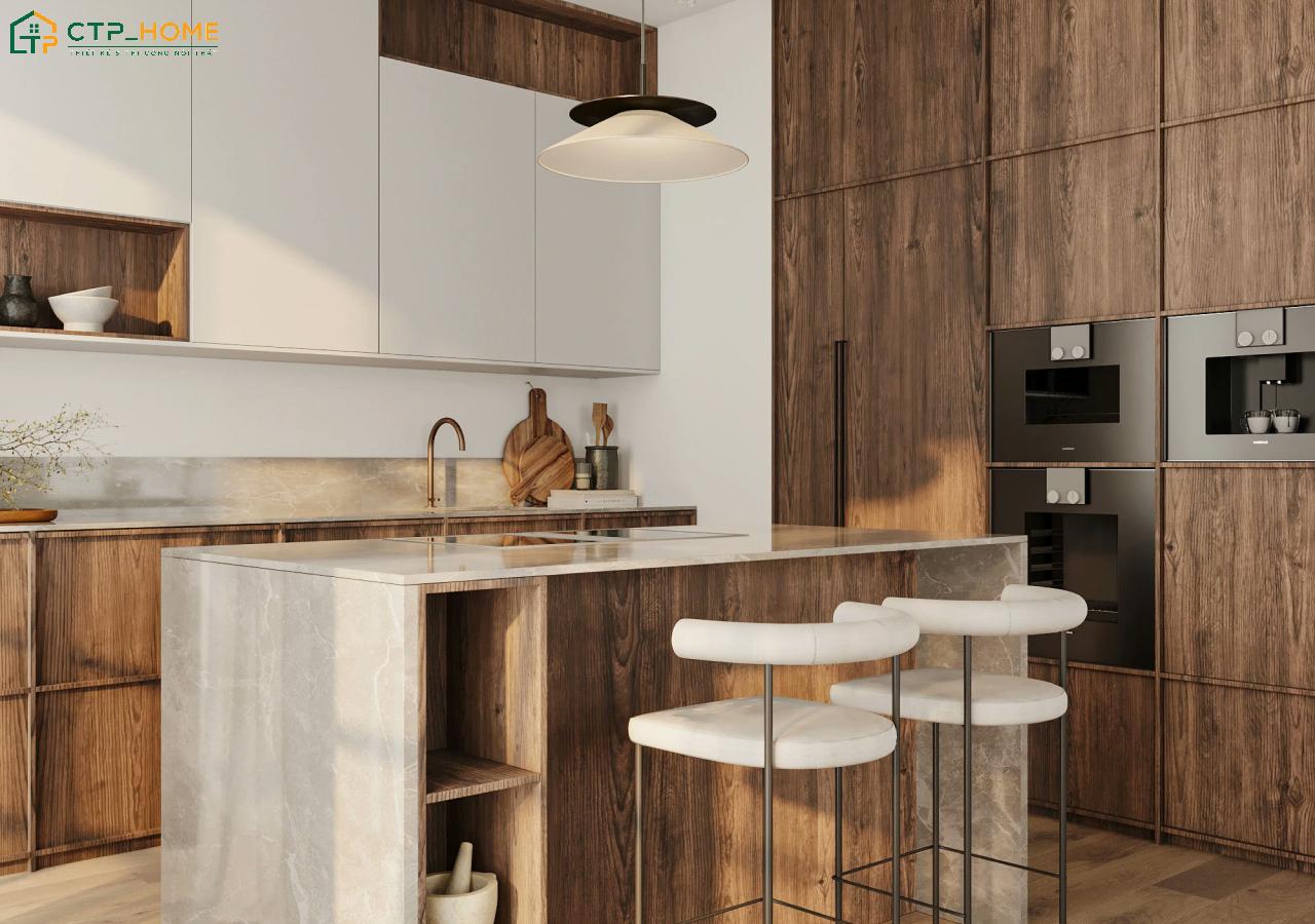 Nội thất được làm chất liệu gỗ mộc mạc giúp mang đến cảm giác ấm cúng cho nhà bếp biệt thự