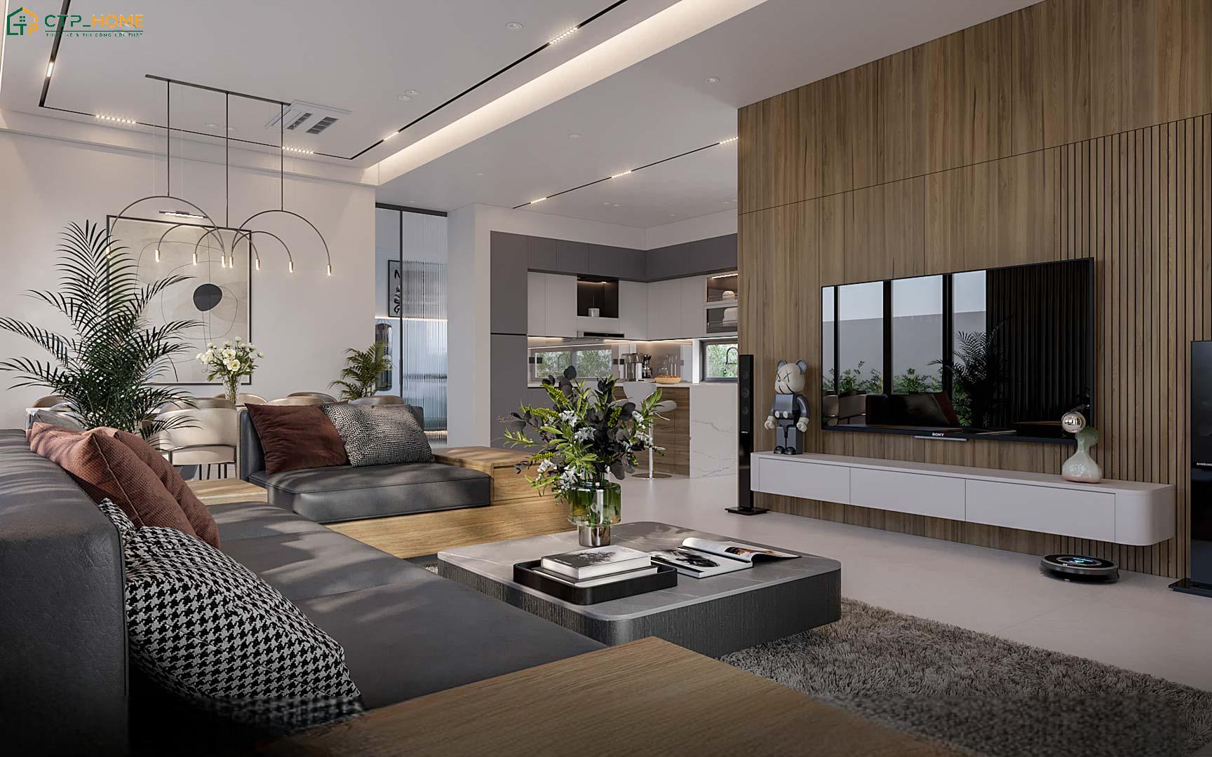 Bàn ăn bằng gỗ là điểm nhấn nổi bật trong mẫu thiết kế nội thất phòng khách liền bếp nhà cấp 4