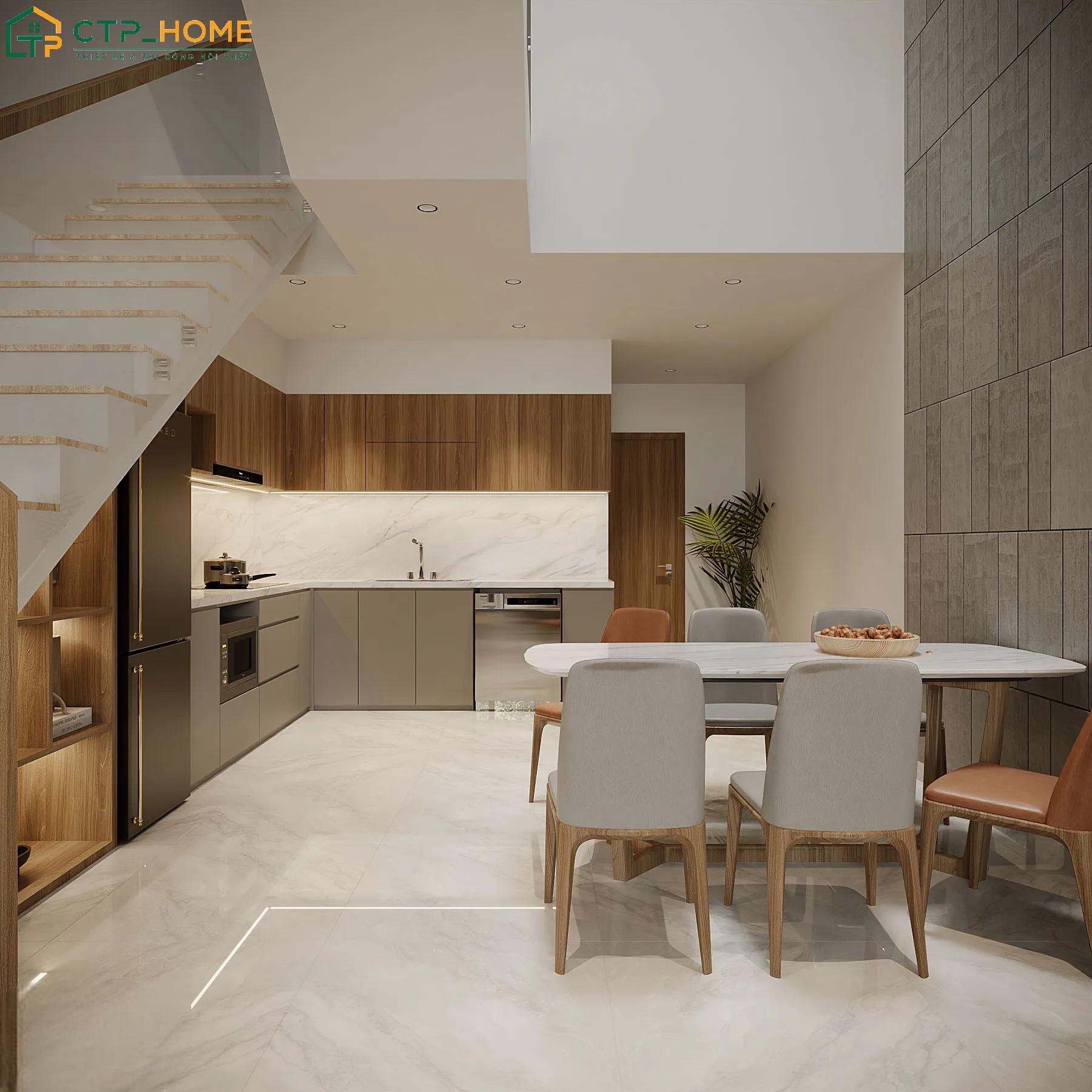 Bố trí phòng khách kết hợp bếp dưới gầm cầu thang sẽ giúp tận dụng tối đa diện tích sử dụng