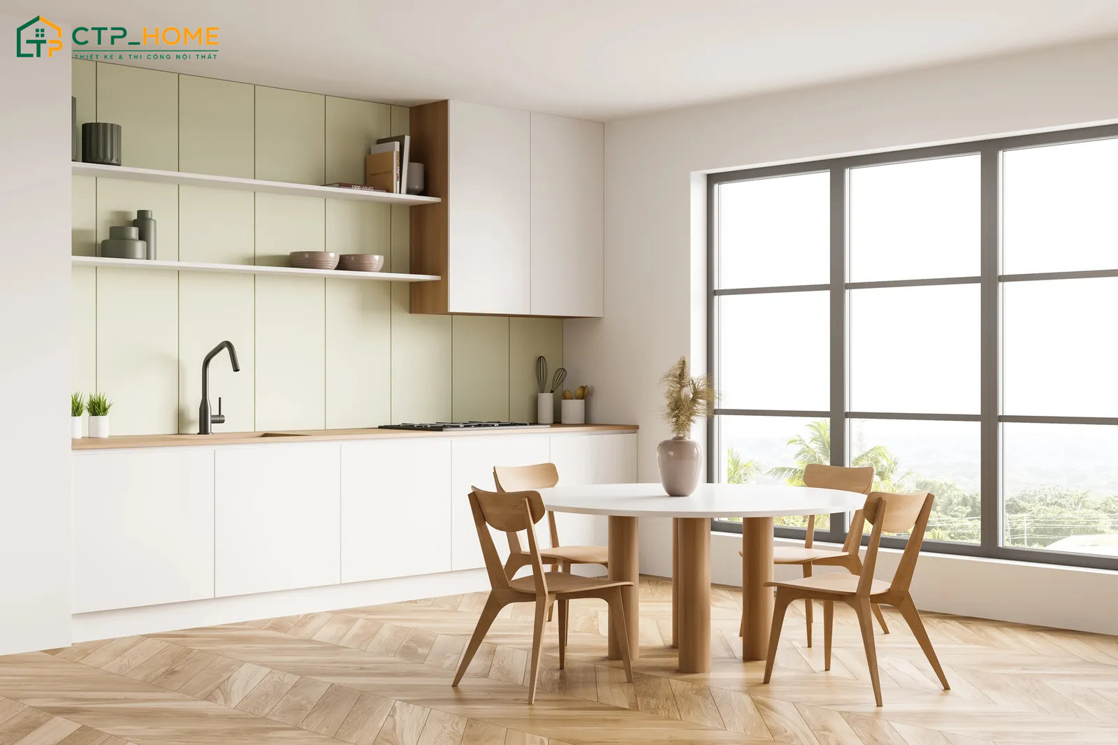 Hệ tủ bếp thông minh tích hợp thiết bị nấu nướng là điểm nổi bật của mẫu decor phòng bếp nhỏ tối giản