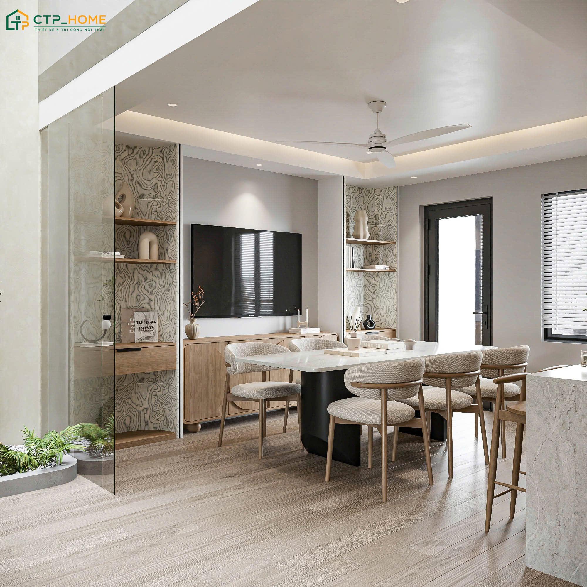 Không gian phòng ăn được thiết kế với tone màu trung tính giúp mang lại vẻ đẹp hiện đại cho ngôi nhà