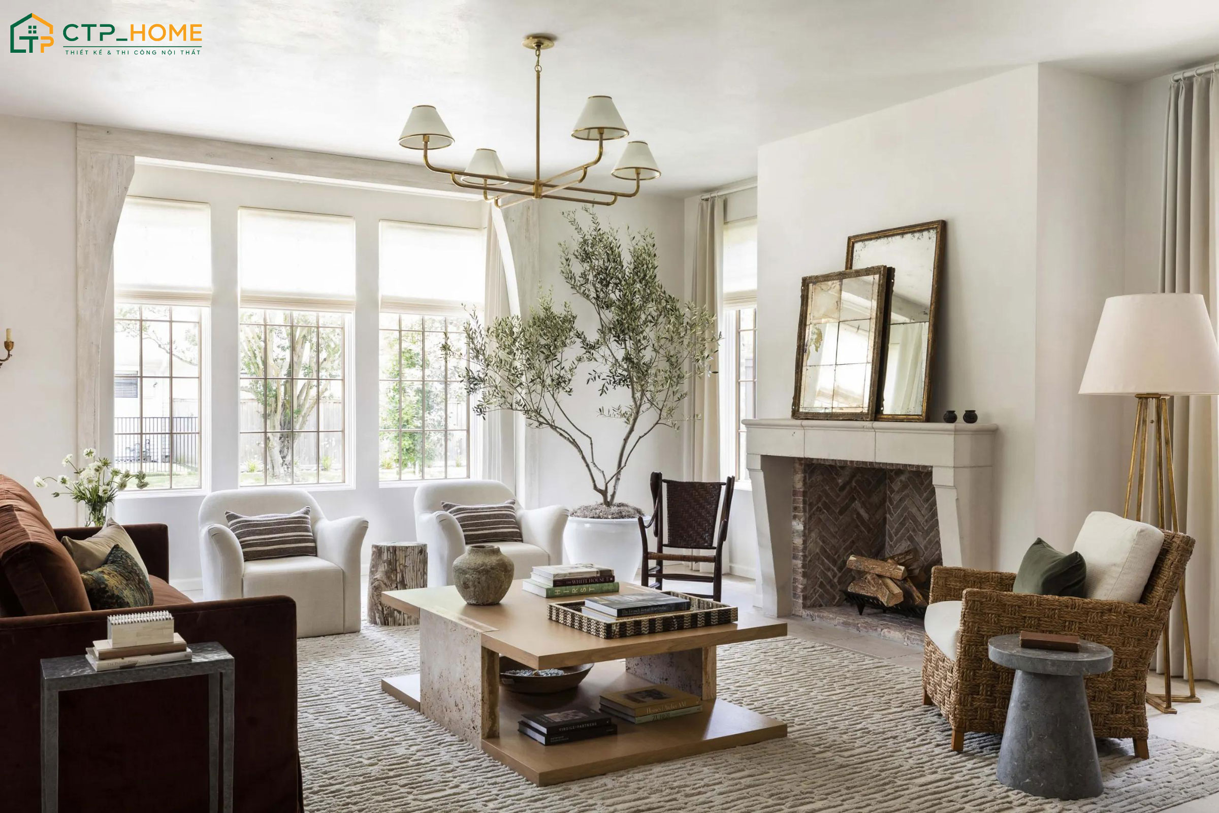 Mẫu decor phòng khách đẹp bằng đèn sẽ giúp tạo điểm nhấn và mang đến cảm giác ấm cúng hơn