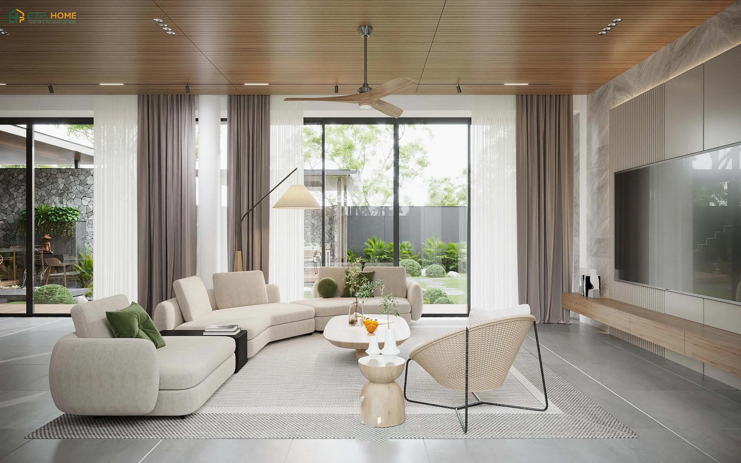 Mẫu decor phòng khách tối giản hiện đại thường ưu tiên thiết kế không gian mở để thu hút ánh sáng tự nhiên