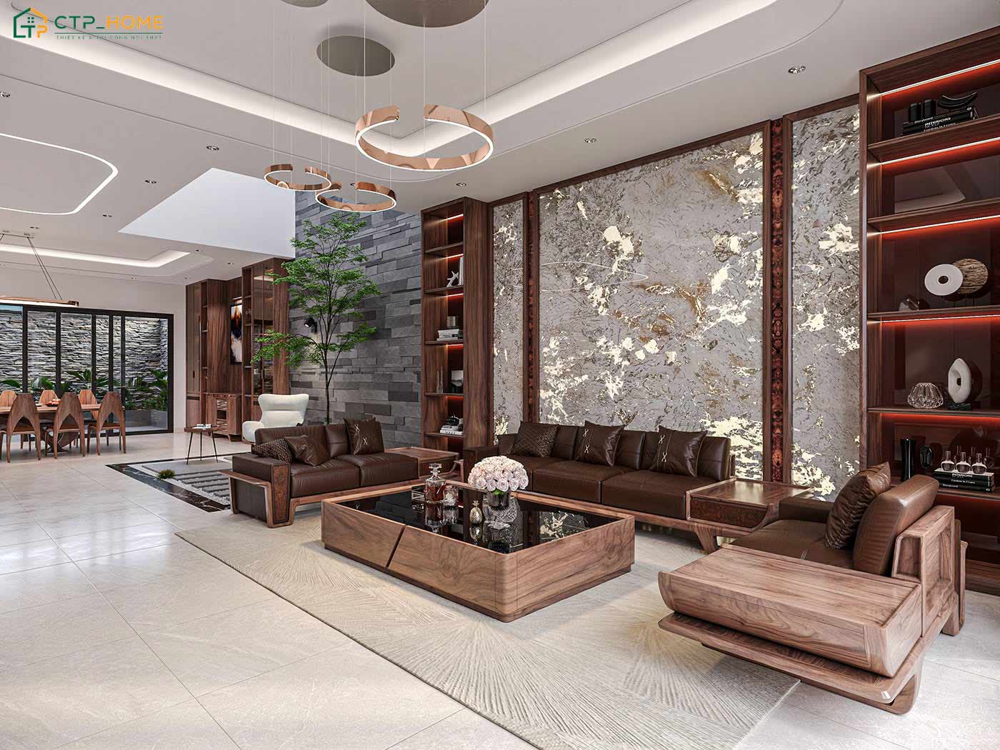 Không gian phòng khách sử dụng nội thất gỗ óc chó kết hợp cùng đá marble ốp tường để tạo điểm nhấn