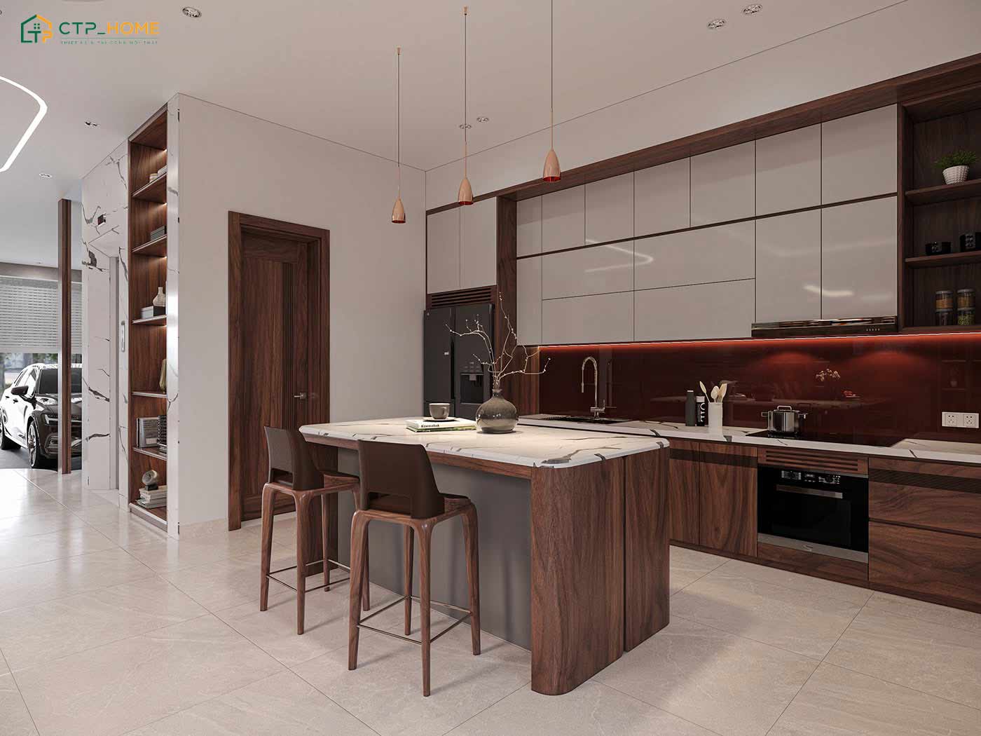 Không gian bếp được bố trí hài hòa giữa màu nâu trầm của gỗ cùng gam màu sáng của các vật liệu khác