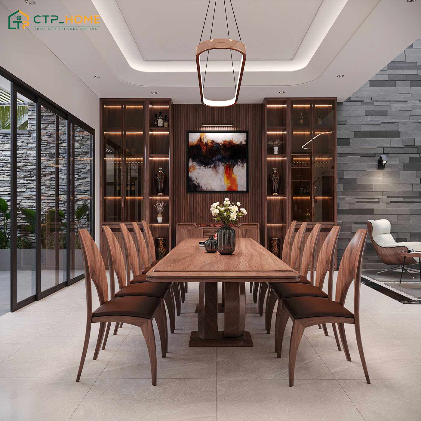 Khu vực ăn uống cũng được sử dụng gỗ óc chó cao cấp để giúp tạo sự đồng bộ với không gian bếp