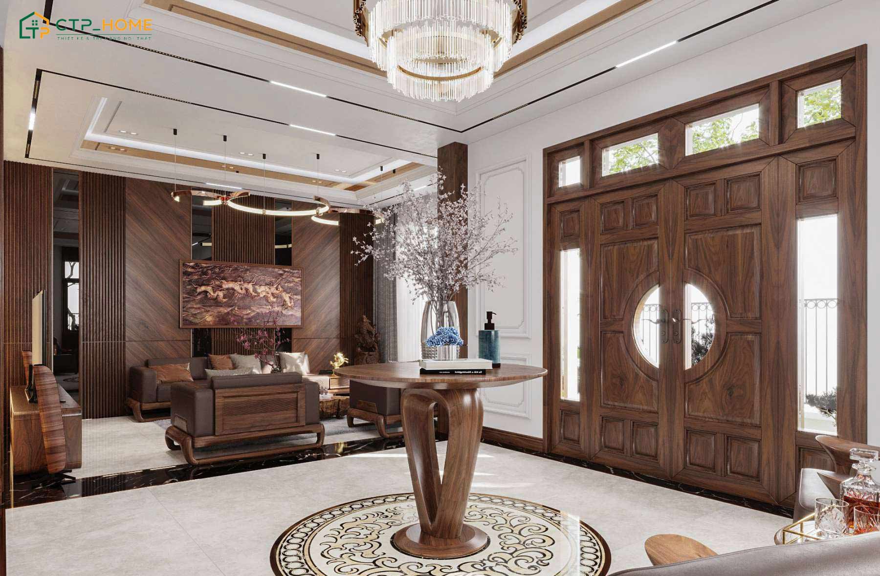 Sảnh biệt thự sẽ sử dụng bàn Console tròn bằng gỗ óc chó kết hợp với cửa gỗ lớn để tạo điểm nhấn