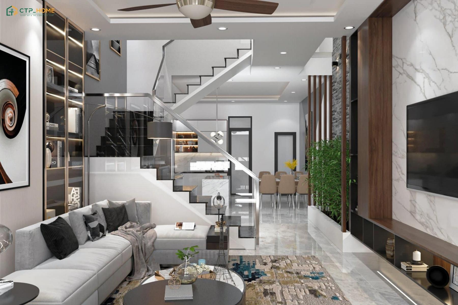 Mẫu phòng khách nhà ống ngang 3m sẽ trở nên thông thoáng hơn khi sử dụng sofa mini và vách lam gỗ đơn giản