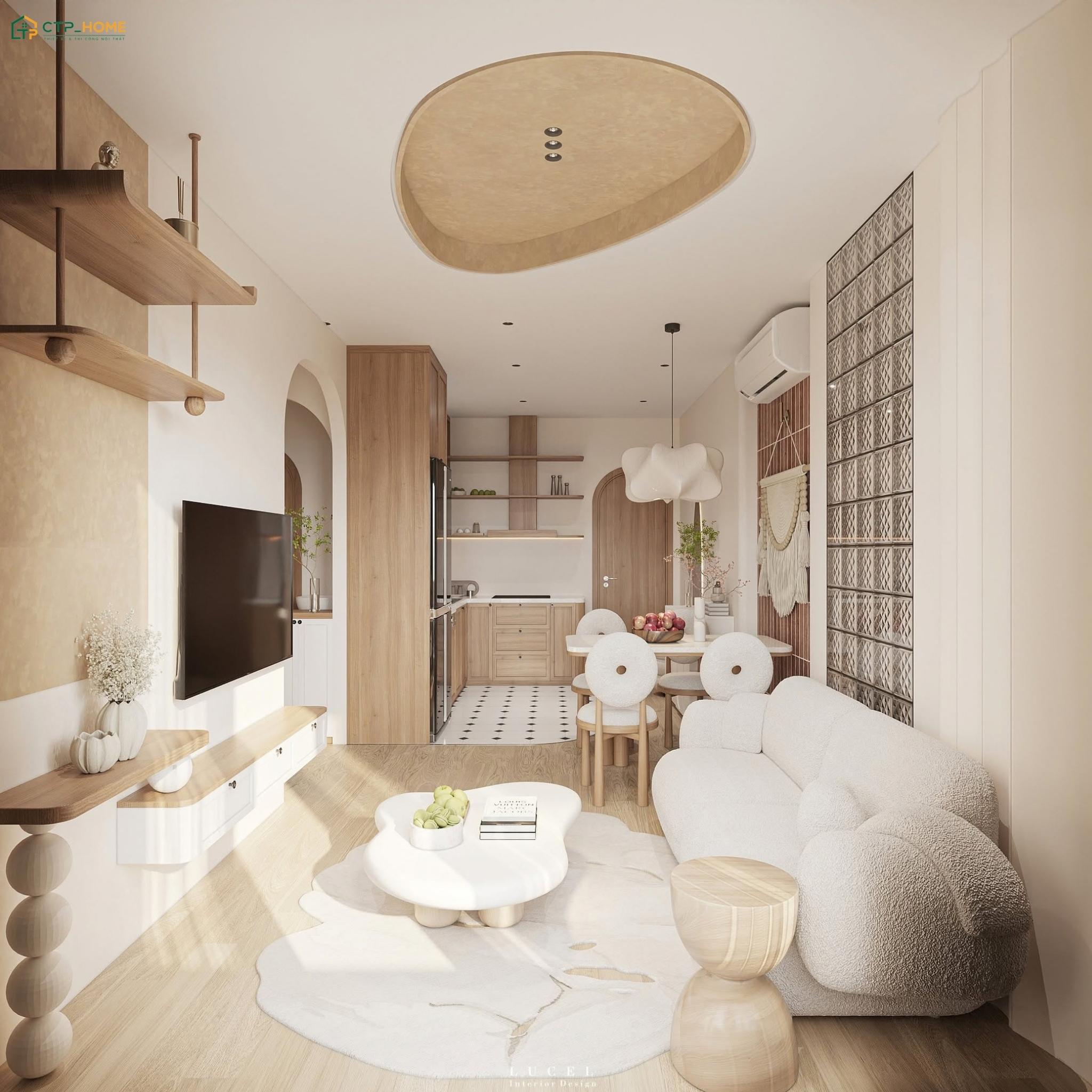 Mẫu phòng khách nhà ống 3m nhẹ nhàng với tông màu kem kết hợp cùng sofa bo cong và bàn trà nhỏ gọn