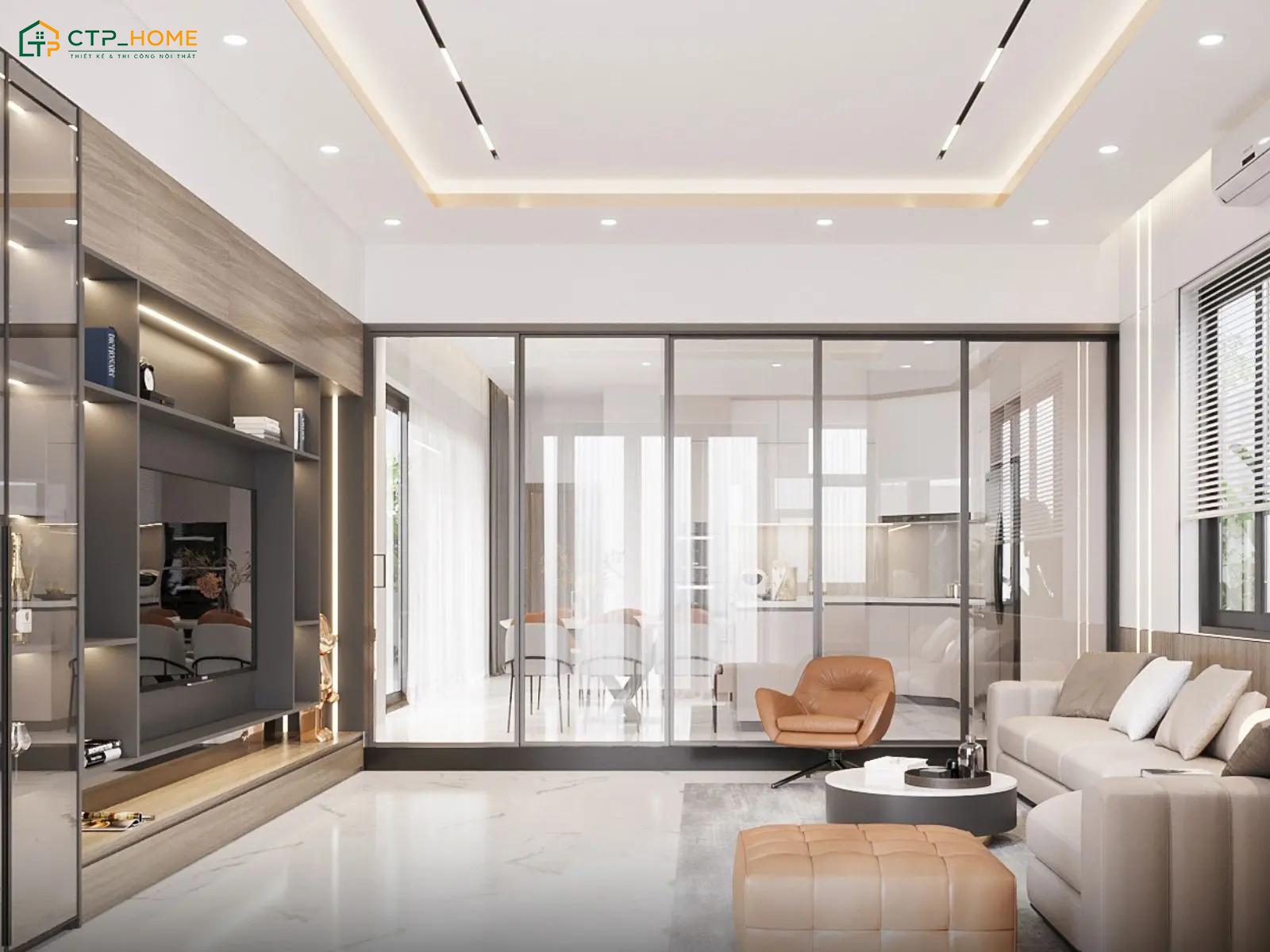 Mẫu thiết kế phòng khách nhà ống đẹp 4m sử dụng kính mờ để tạo sự riêng tư mà vẫn giữ được độ thoáng
