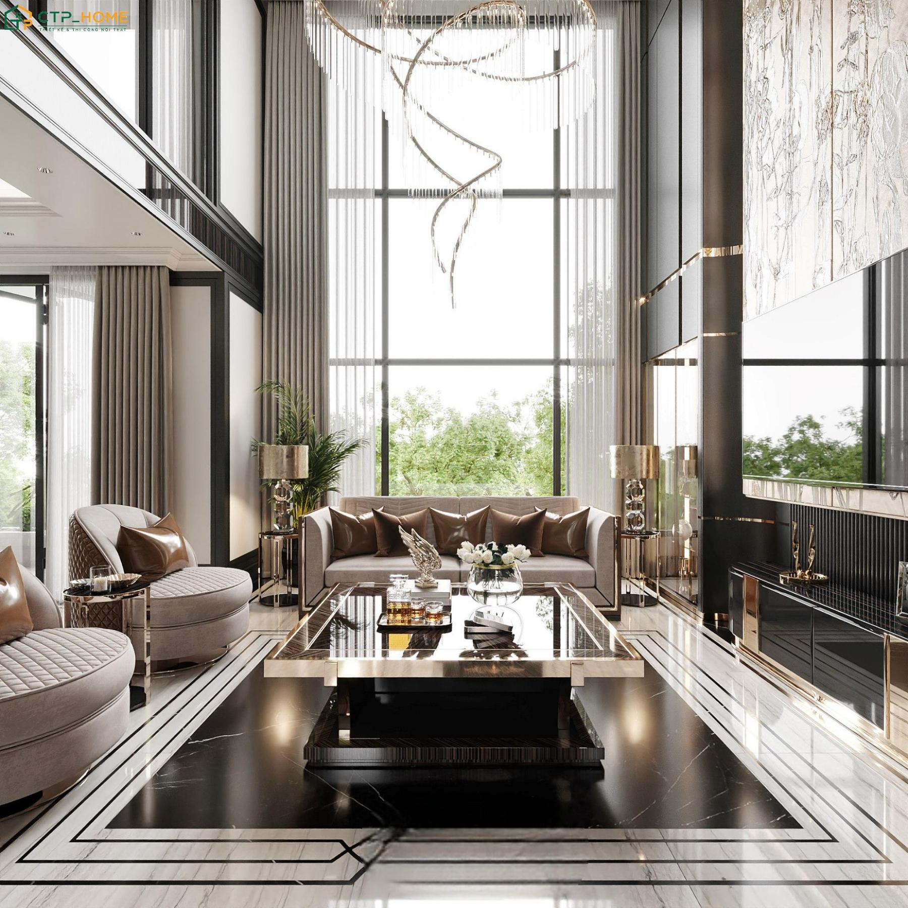 Thiết kế trần cao cùng cửa kính lớn giúp phòng khách dạng thông tầng đón được nhiều ánh sáng tự nhiên
