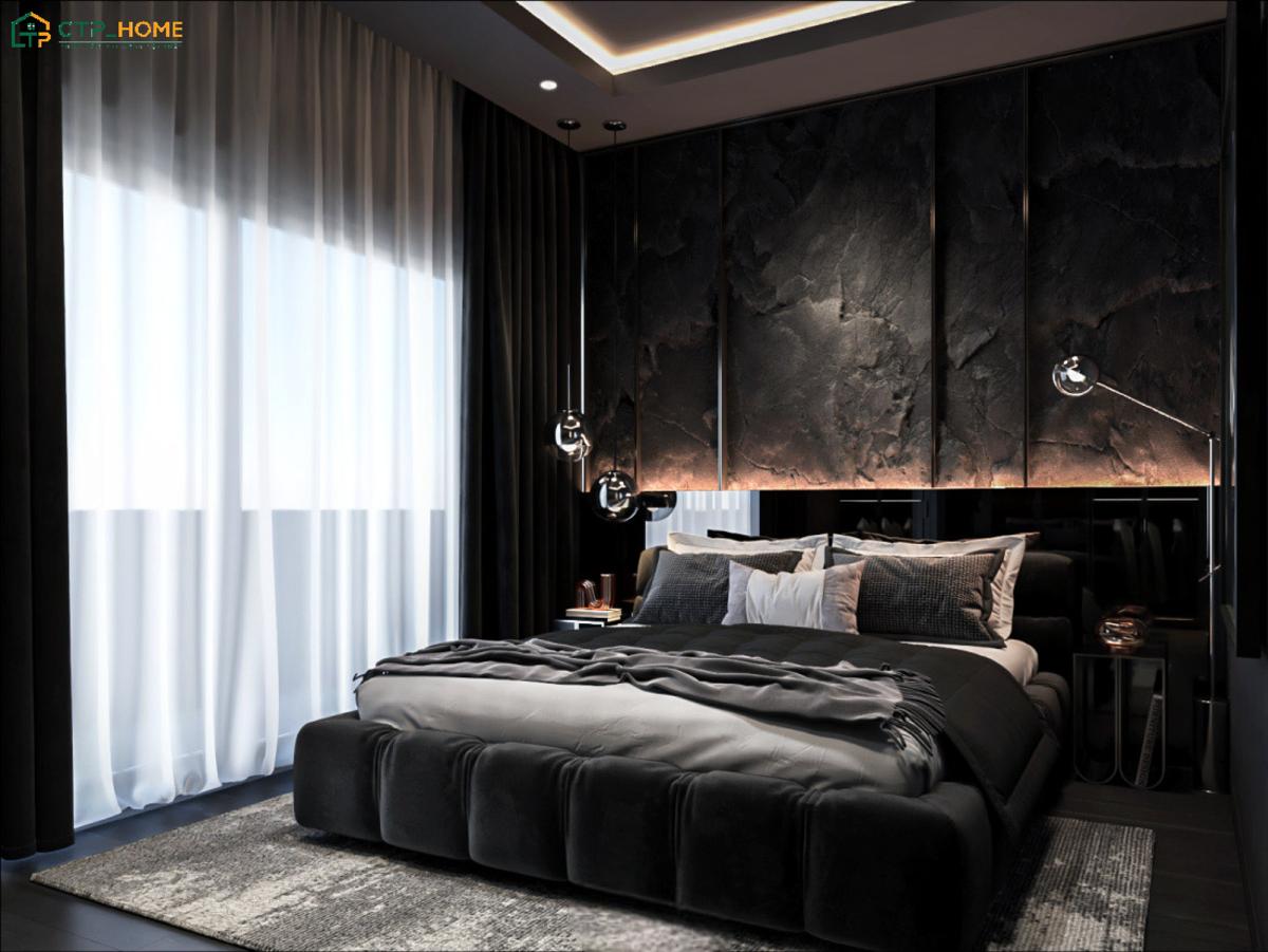 Sử dụng bức tường đá gồ ghề để làm điểm nhấn sẽ giúp phòng ngủ màu đen trở nên ấn tượng hơn