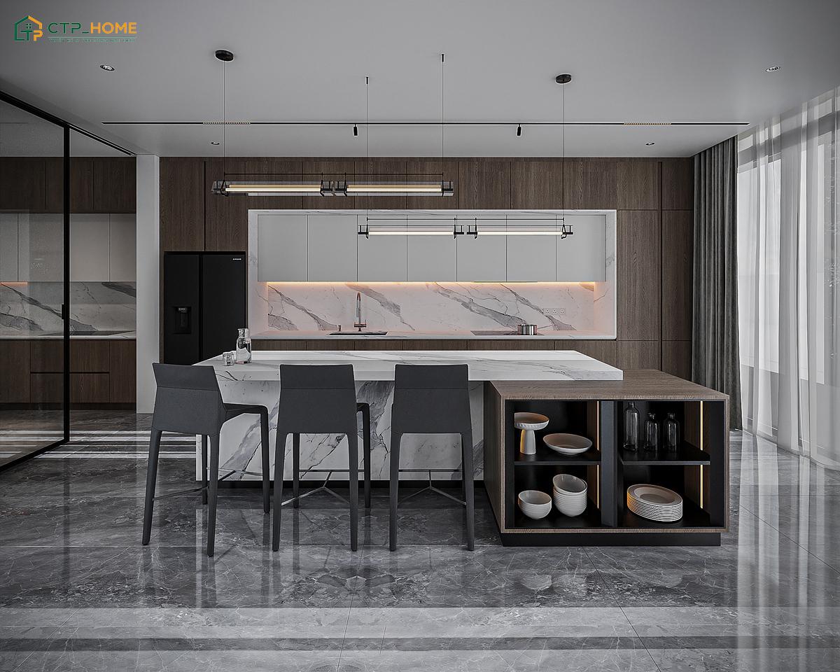 Không gian nấu ăn được trang bị đầy đủ tiện nghi với bàn đảo bếp bằng đá cao cấp làm điểm nhấn