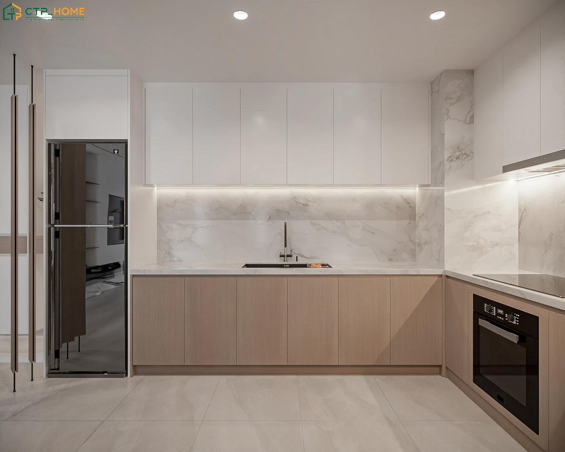 Mẫu thiết kế nội thất nhà chung cư 65m2 nổi bật với hệ tủ bếp kịch trần màu trắng nâu kết hợp đá trắng vân mây