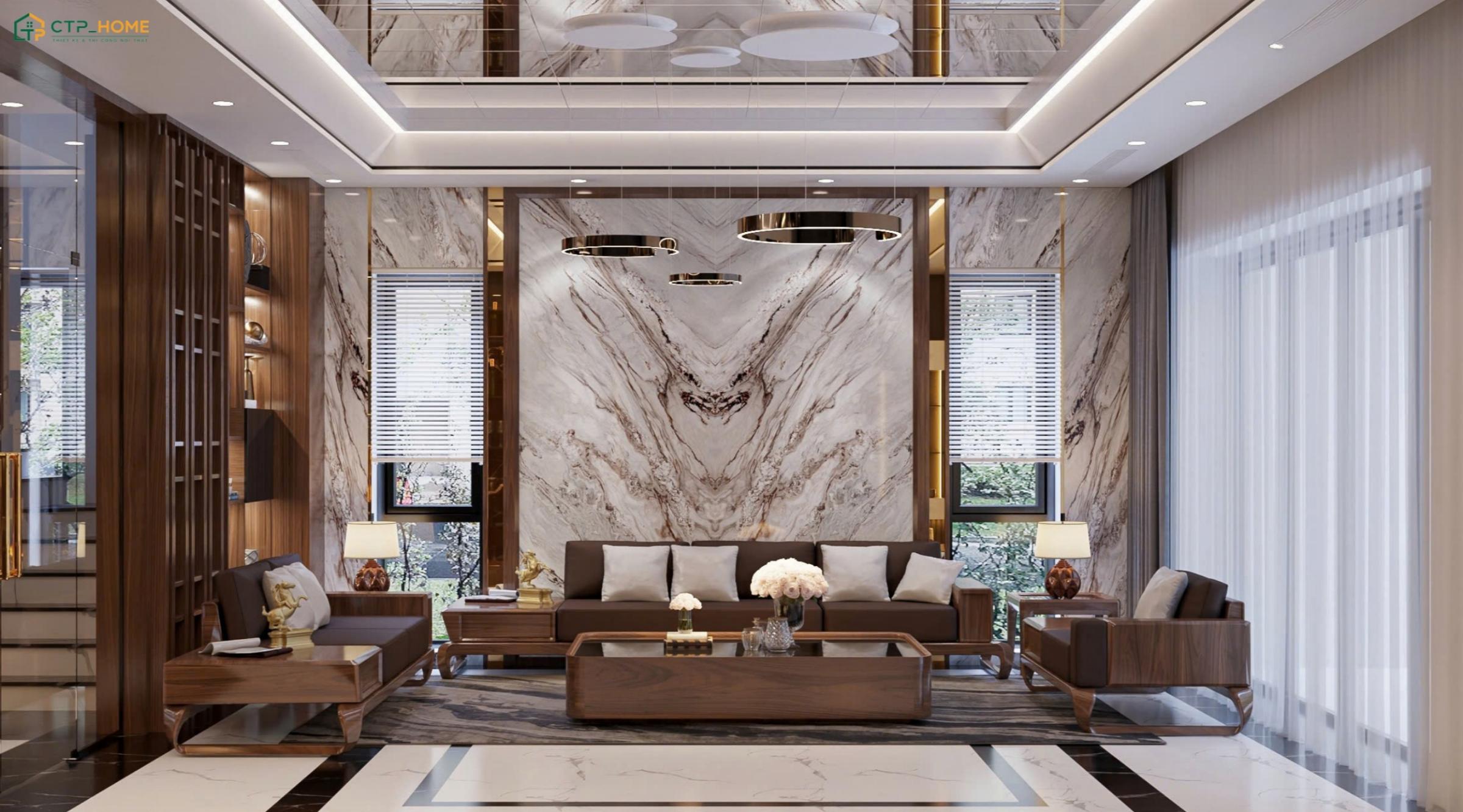 CTP Home sử dụng đá marble vân mây phía sau sofa cùng nội thất gỗ để tạo điểm nhấn cho phòng khách