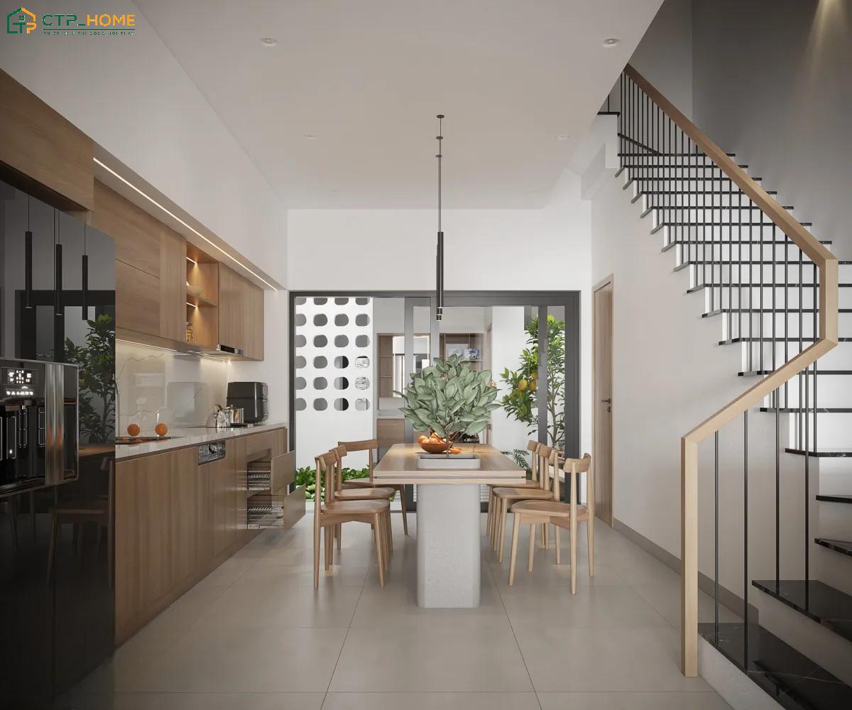 Hệ tủ bếp được sắp xếp dọc theo tường giúp phòng bếp nhà ống 5m có thêm khoảng trống khi di chuyển
