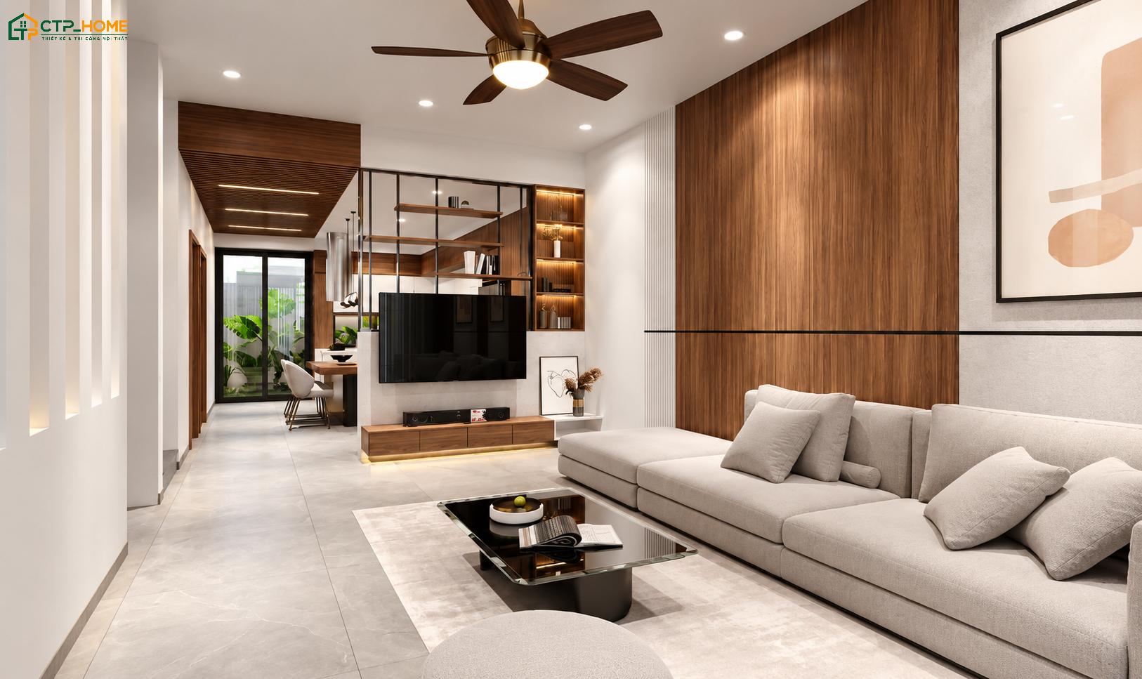 Mẫu trang trí phòng khách 20m2 thường sử dụng vách ngăn kết hợp kệ tivi để mang đến vẻ đẹp hiện đại và tiện nghi