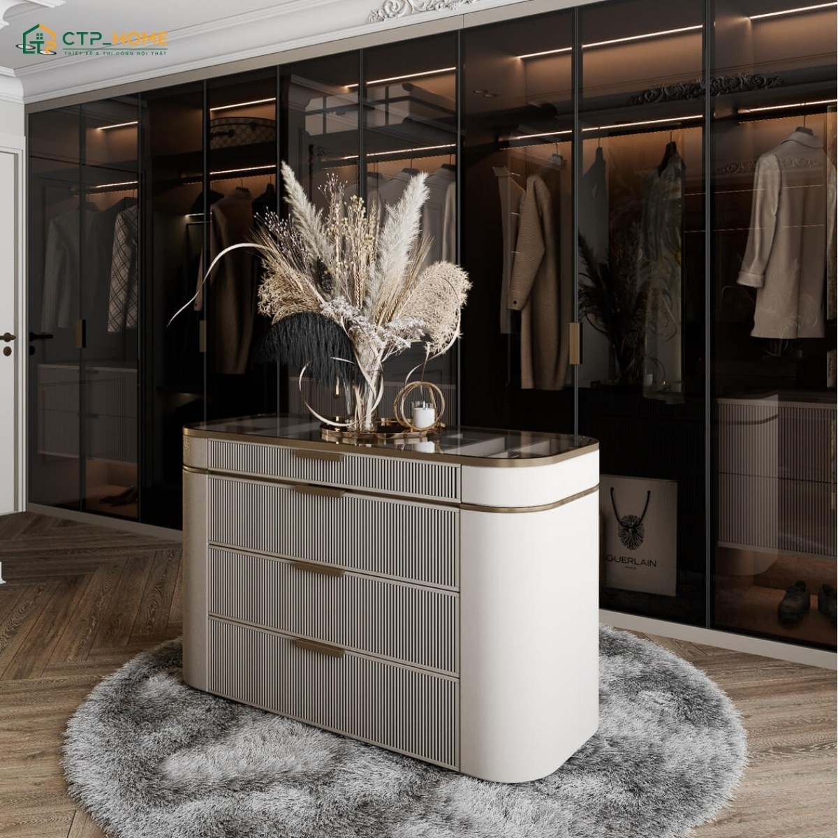 Việc bố trí bàn đảo phụ kiện giúp mang đến vẻ đẹp sang trọng cho mẫu thiết kế phòng thay đồ